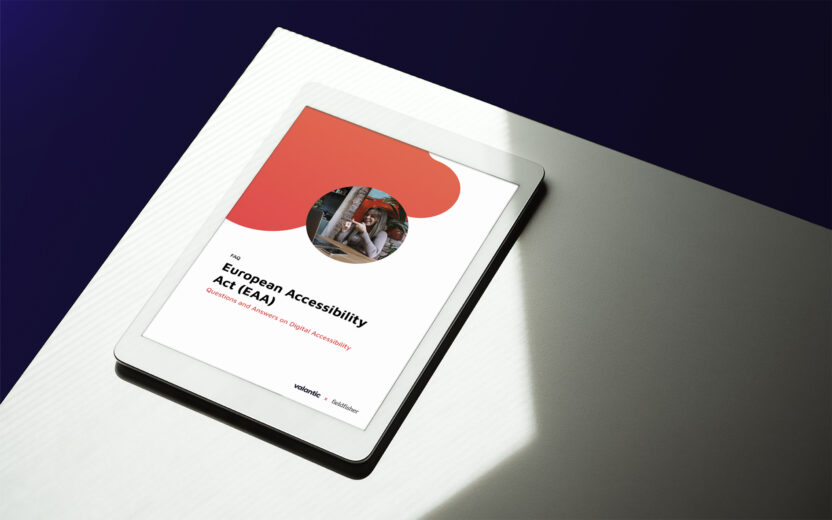 Tablet on a table displaying a document titled "European Accessibility Act (EAA)" with abstract design elements.