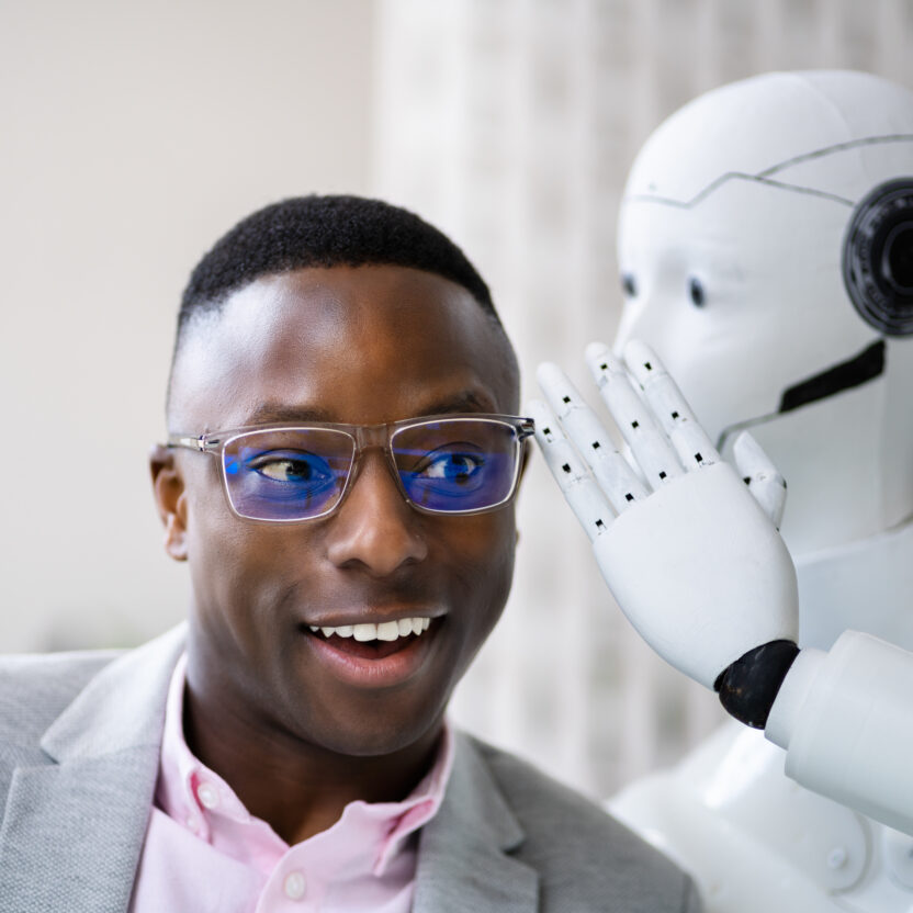 Robot talks to an interested business man Robot talks to an interested business man